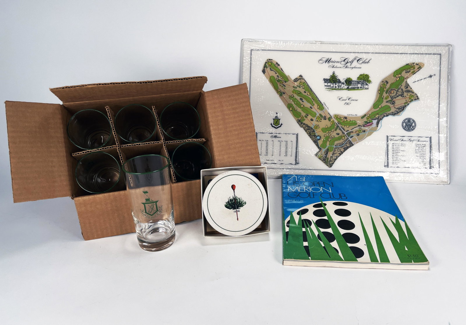 MERION COUNTRY CLUB GOLF MEMORABILIA: MERION COUNTRY CLUB GOLF MEMORABILIA Memorabilia from the famous Main Line Merion Golf Club including placemats of the East Course 1912 sealed, 71st US Open Championships program from J