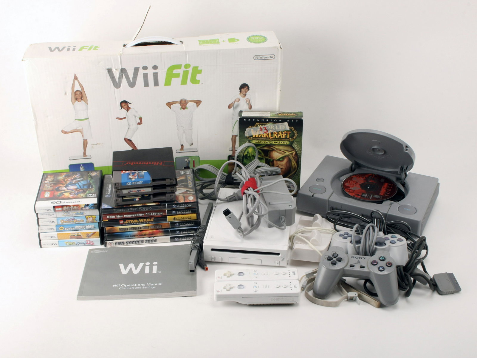 LOT OF VIDEO GAME CONSOLES GAMES NINTENDO SONY: LOT OF VIDEO GAME CONSOLES GAMES NINTENDO SONY Includes Playstation 1 console, Nintendo Wii console, three Nintendo NES sports games, 6 Nintendo Gamecube games, and empty Nintendo DS gam