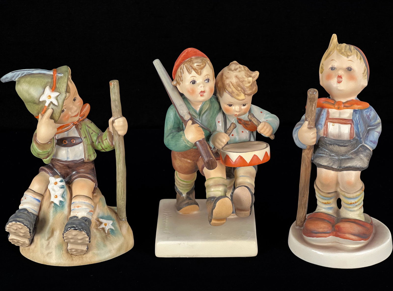 THREE ADVENTUROUS GOEBEL HUMMEL FIGURINES (1 of 5)
