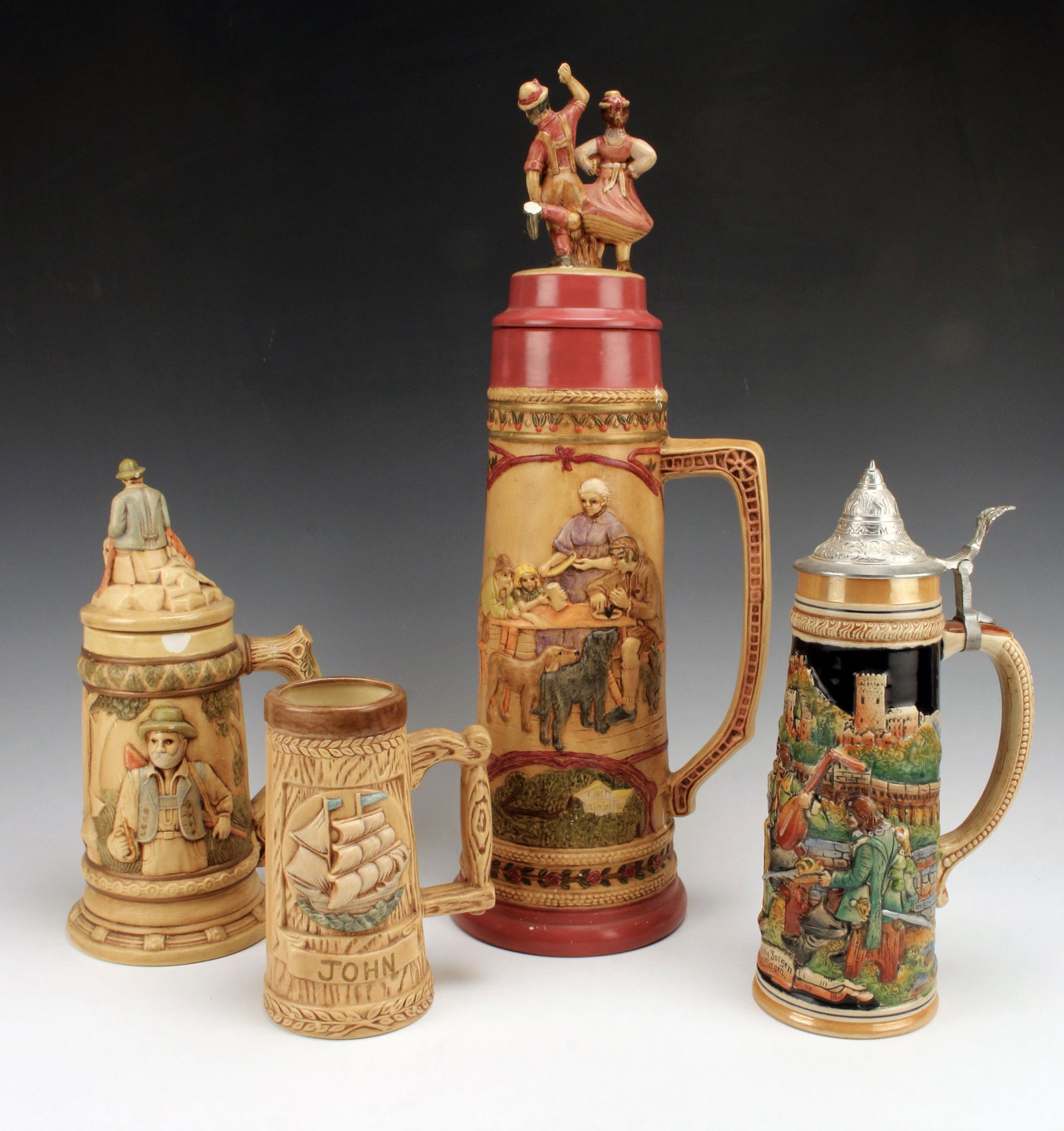 FOUR LARGE CERAMIC BEER STEINS (1 of 9)
