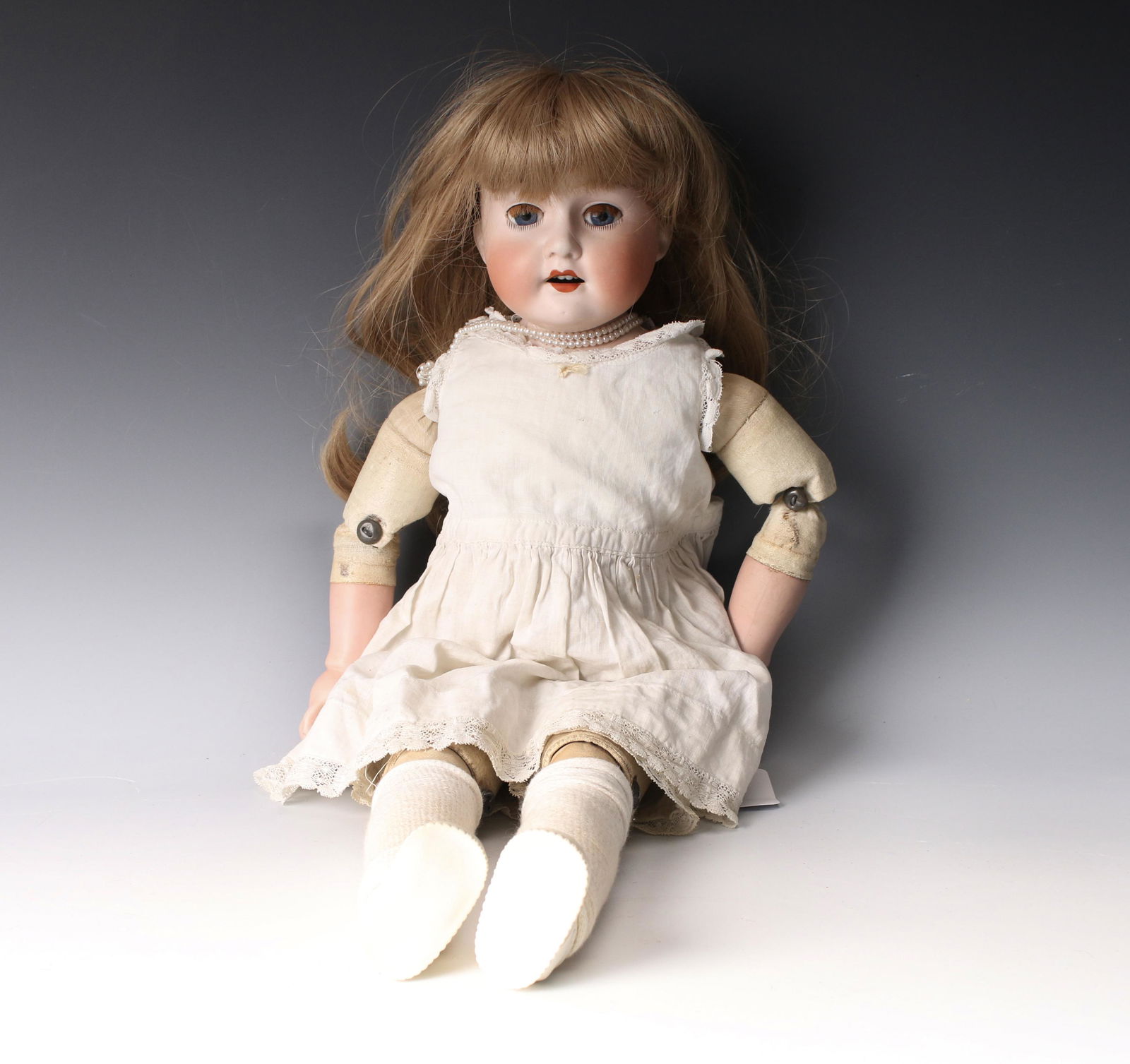 MORIMIRA BROTHERS LEATHER & PORCELAIN DOLL (1 of 7)
