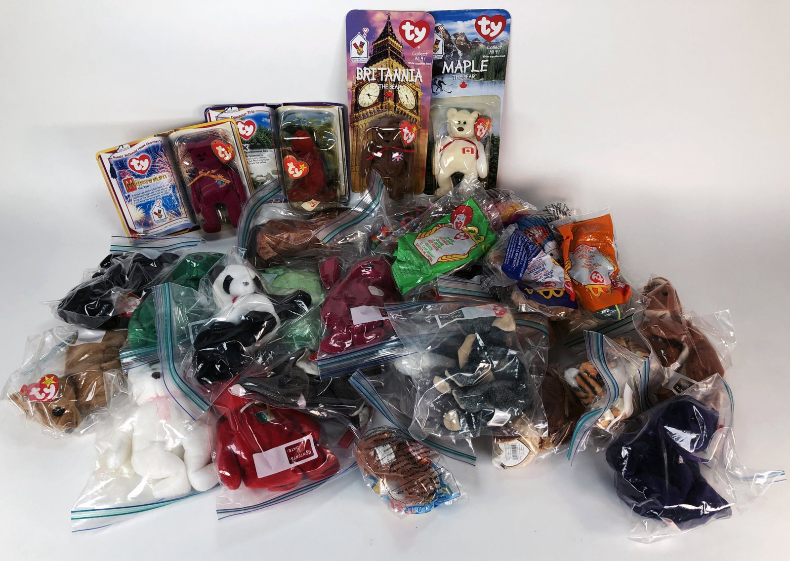 COLLECTION OF BEANIE BABIES: COLLECTION OF BEANIE BABIES Various Beanie Babies from several years. Some in packages. Shipping: Shipping and handling in the contin