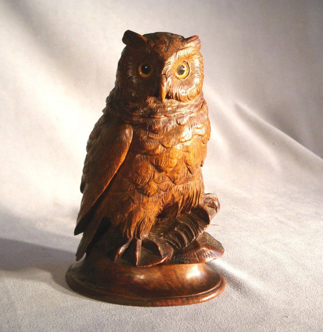 Carved Owl: Inside you can store your secret dreams. A finely carved 6" owl, probably of Black Forest origins whose head hinges open to a match holder.
