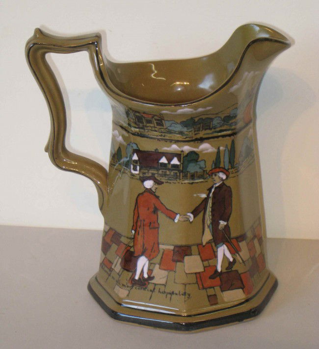 Commemorative Boston Pitcher: An 8" Deldare ware pitcher commemorating friendship by the Buffalo Pottery with Deldare underglaze, dated 1908.