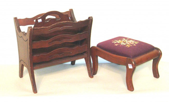 footstool and magazine rack: A art nouveau needlepoint covered foot stool in cherry together with a cherry toned magazine rack.