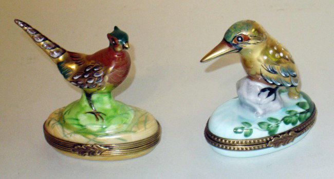 Brightly colored Limoges pill boxes: Two hand painted porcelain hinged boxes by Limoges, each with birds: the kingfisher and pheasant.