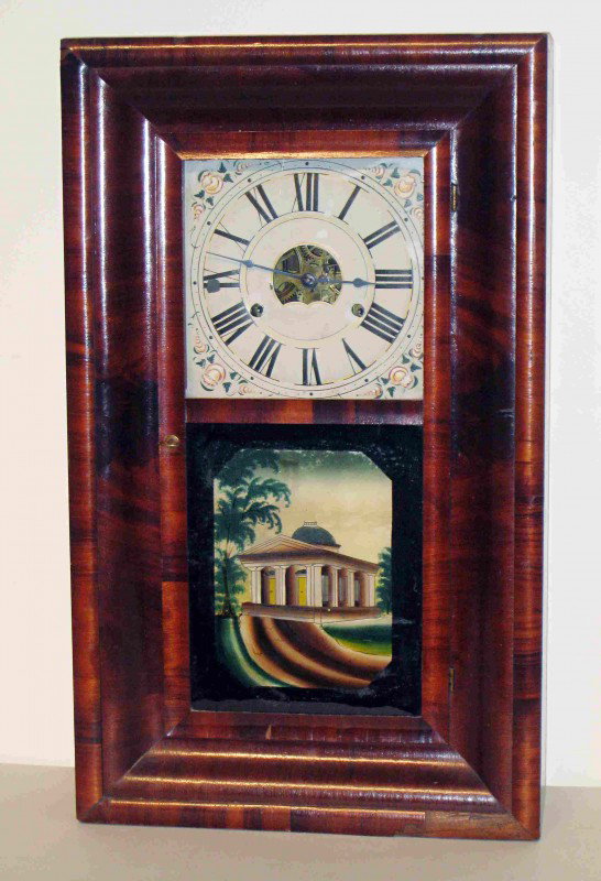 Ogee shelf clock : A 19th century shelf clock with original reverse painting of a pillared building.