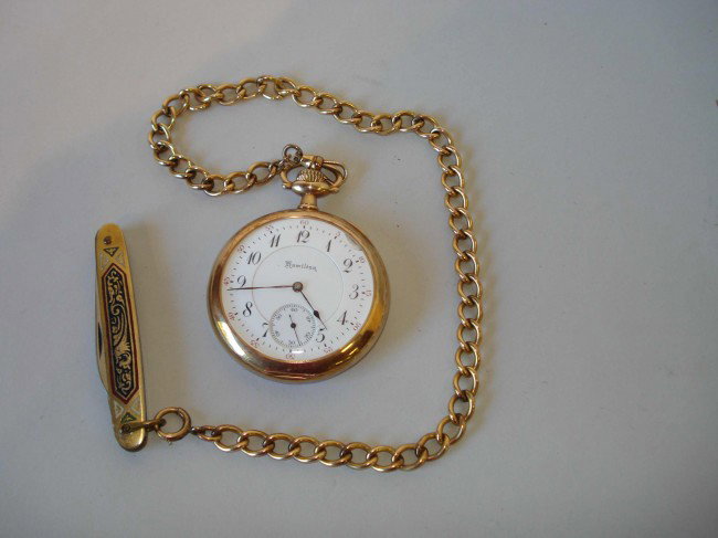 A fine gold pocket watch by Hamilton: A fine gold pocket watch in a 14K gold opened face case by Hamilton, model 950. This with the serial number 752,708 (ca 1906-1907)and 23 jewel movement adjusted in 5 positions. The Hamilton Watch Co. 