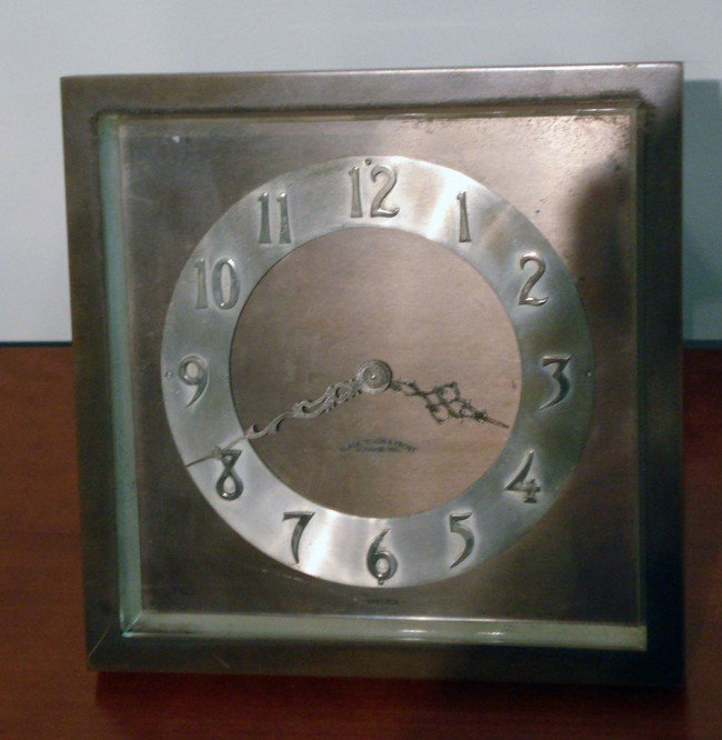 Chelsea Desk Clock : A solid patinated bronze desk clock by Chelsea and signed on the dial "Black Starr & Frost", with an 8" square easel form case and a dial with silvered chapter ring and applied Arabic numerals.
