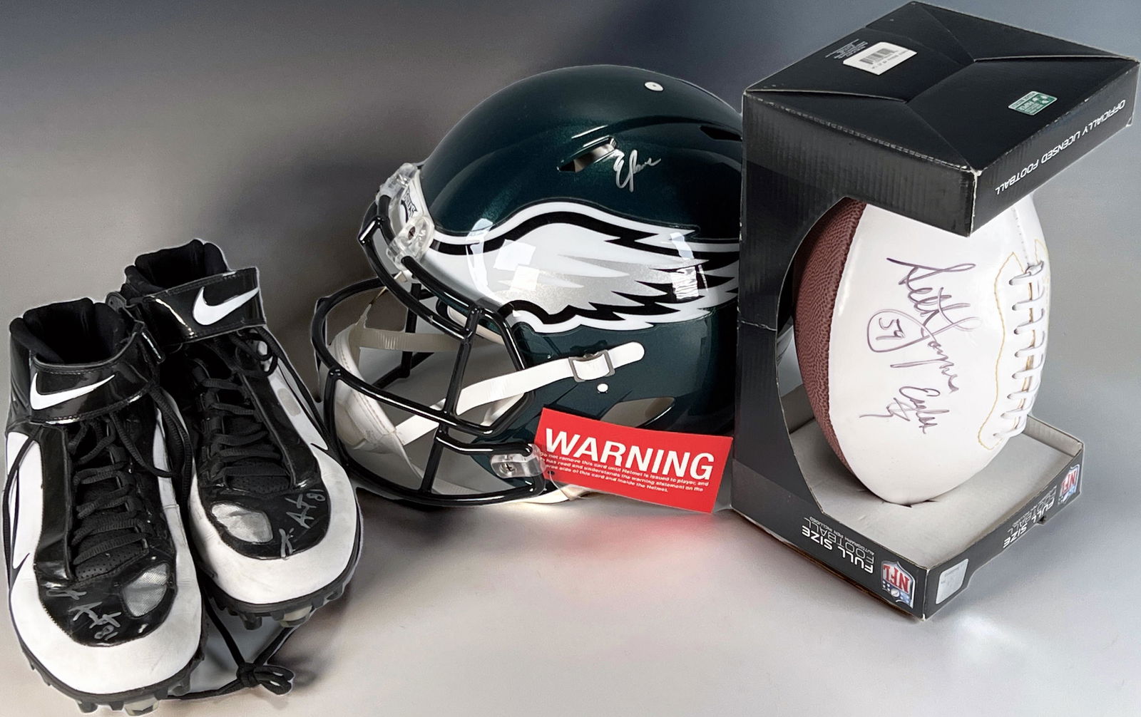 EAGLES SIGNED HELMET FOOTBALL CLEATS (1 of 9)