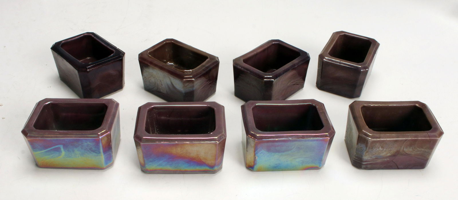 EIGHT FENTON IRIDESCENT GLASS SALT CELLARS: EIGHT FENTON IRIDESCENT GLASS SALT CELLARS Iridescent salt cellars. Unmarked 2" X 1" Shipping: Sh