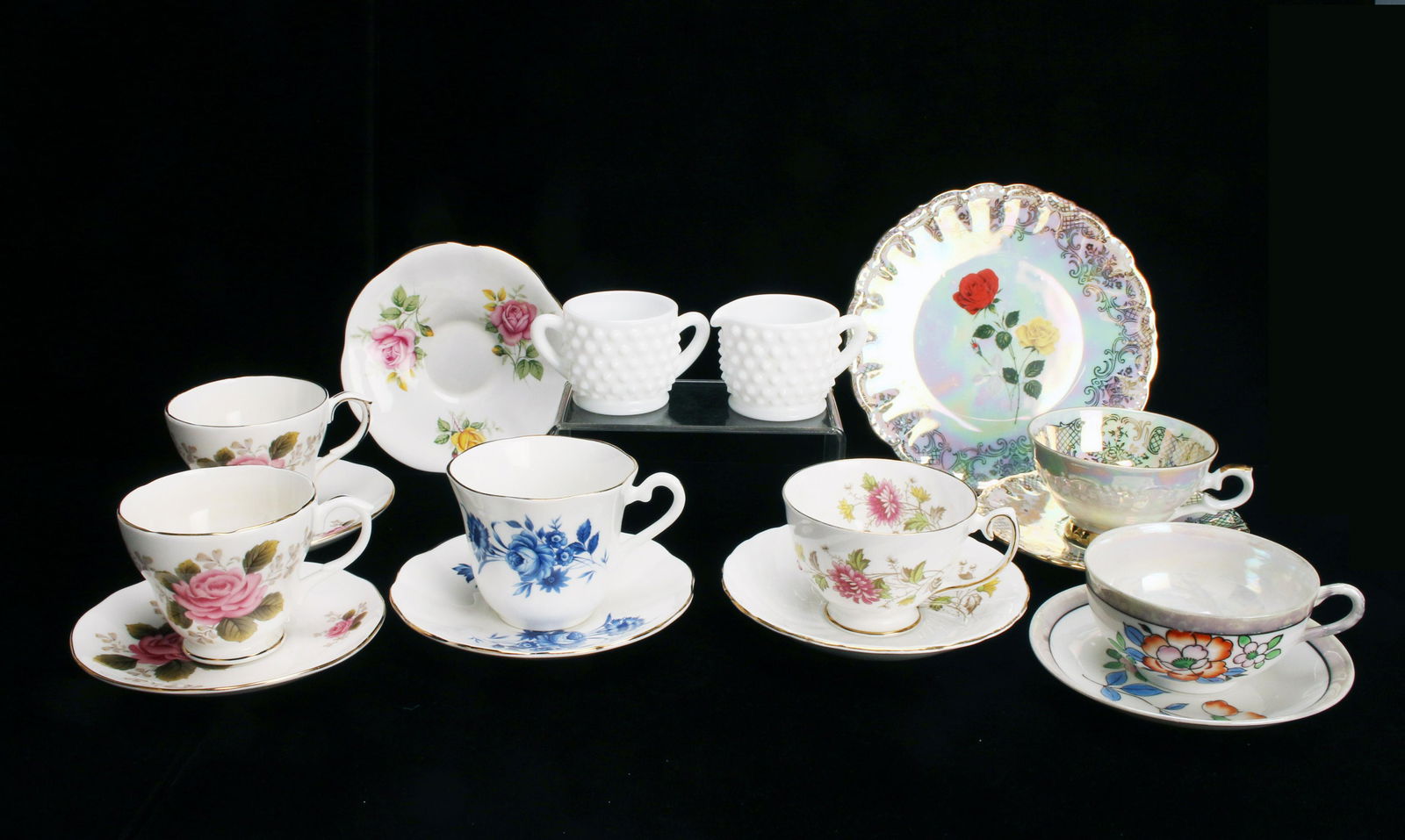FINE CHINA TEA CUPS AND SAUCERS COLLECTION: FINE CHINA TEA CUPS AND SAUCERS COLLECTION Two Duchess Bone China "Fern Rose" cups and saucers; one Elizabethan blue floral cup and saucer; one Gareis Waldsassen Bavaria cup &a