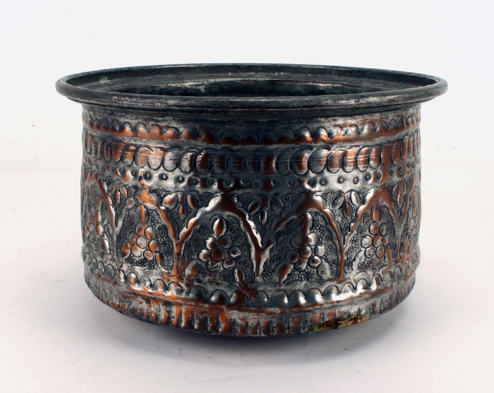 BEDOUIN COPPER & TIN CAMEL MILK BOWL: BEDOUIN COPPER & TIN CAMEL MILK BOWL Used for milking camels. From the Souk at the Hofuf Oasis, Saudi Arabia. Embossed raised stylized floral designs around body of bowl