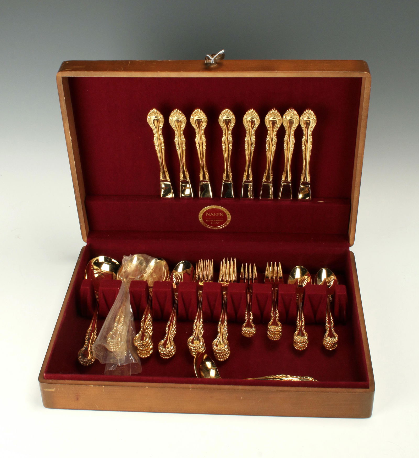 GOLD TONED FLATWARE IN NAKEN SILVER CHEST (1 of 4)