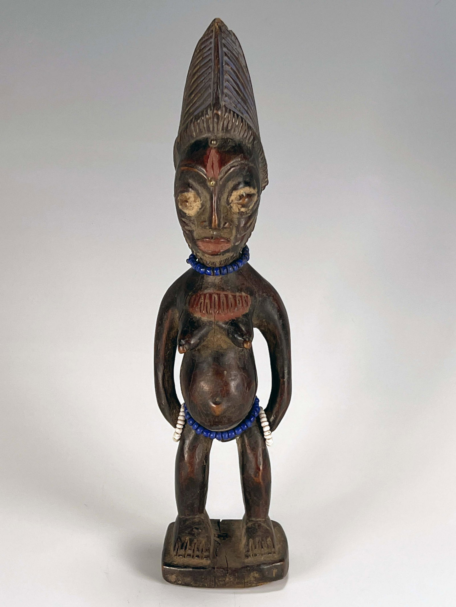 YORUBA IBEJI FEMALE STATUE: YORUBA IBEJI FEMALE STATUE 10 3/4" x 2 3/4" x 2 1/4" Shipping: Shipping and handling in the continental US will cost $20.89
