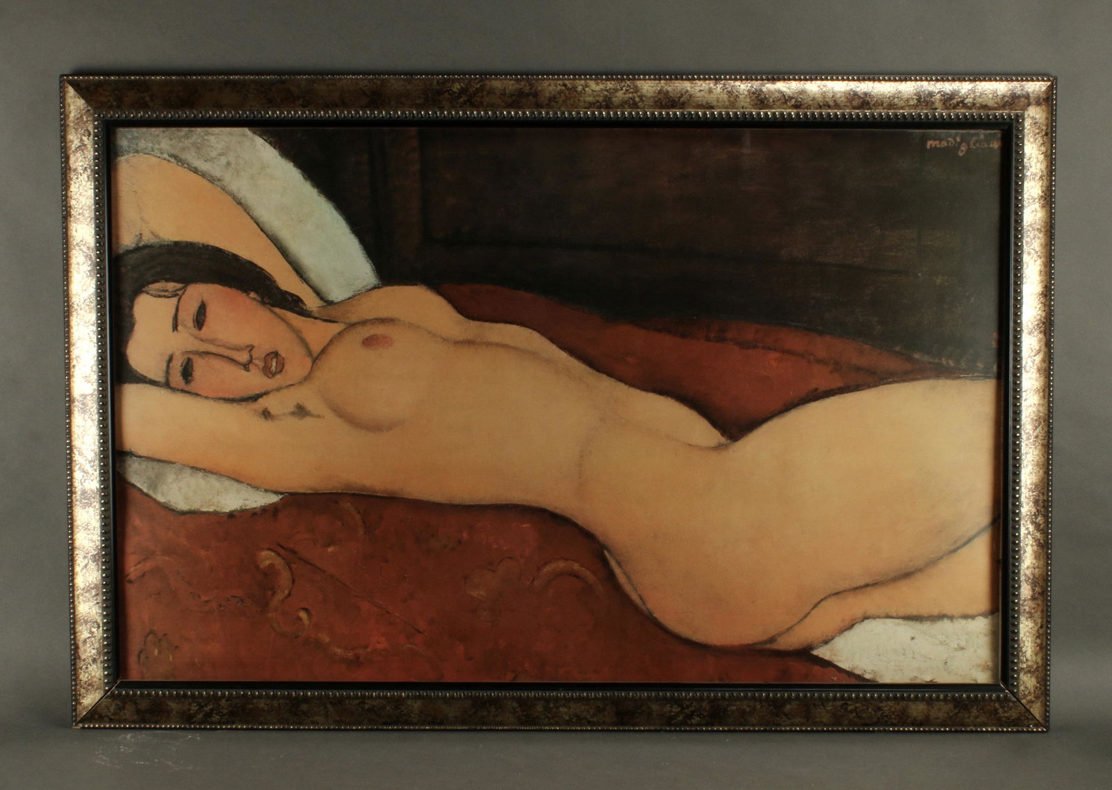 PRINT OF MODIGLIANI RECLINING NUDE: PRINT OF MODIGLIANI RECLINING NUDE Reproduction print of Amedeo Modigliani 1917 "Reclining Nude". Frame corners loose- see photos. 42" X