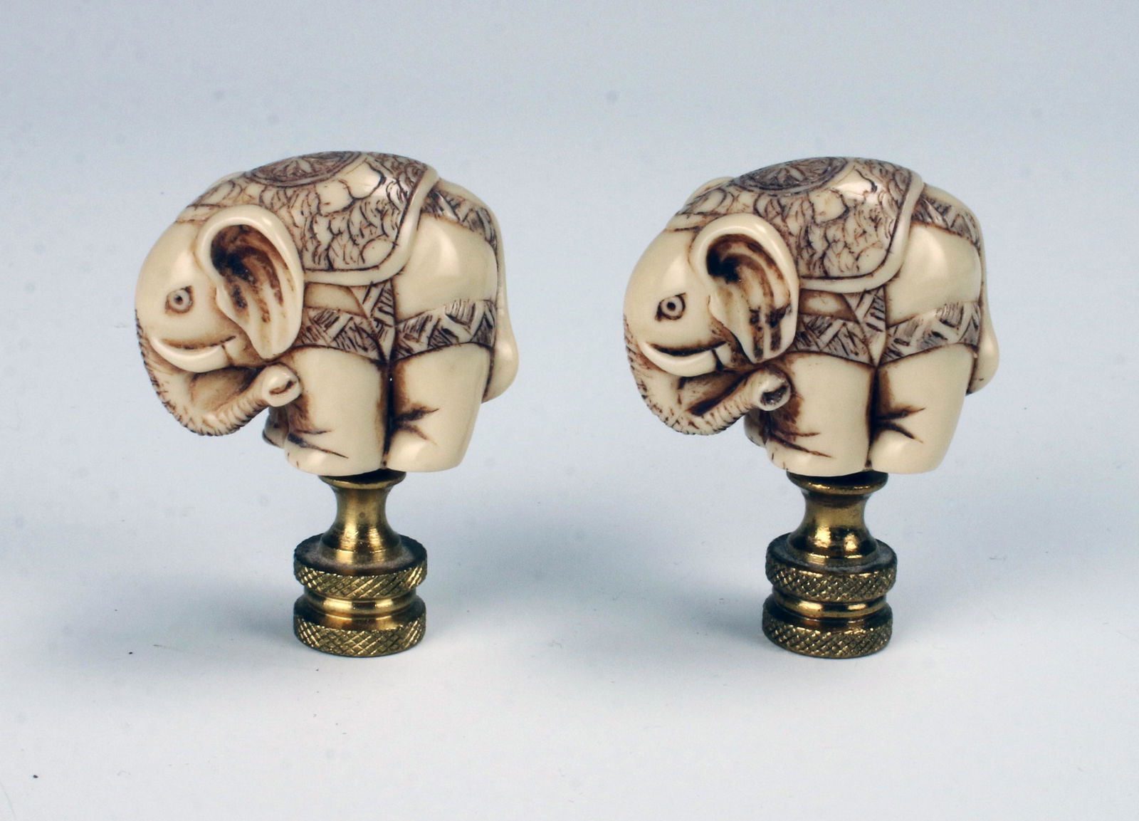PAIR OF CARVED CHINESE RESIN ELEPHANT LAMP FINIALS (1 of 4)