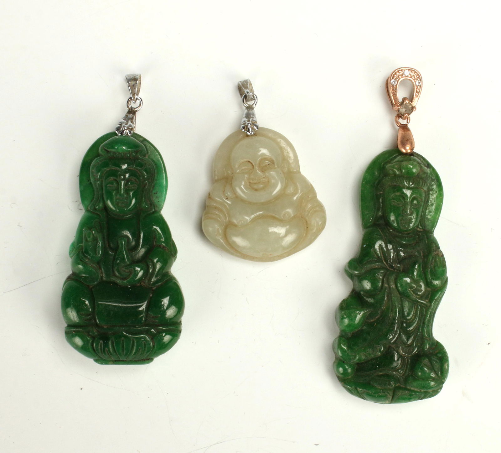 THREE JADE BUDDHA PENDANTS (1 of 3)