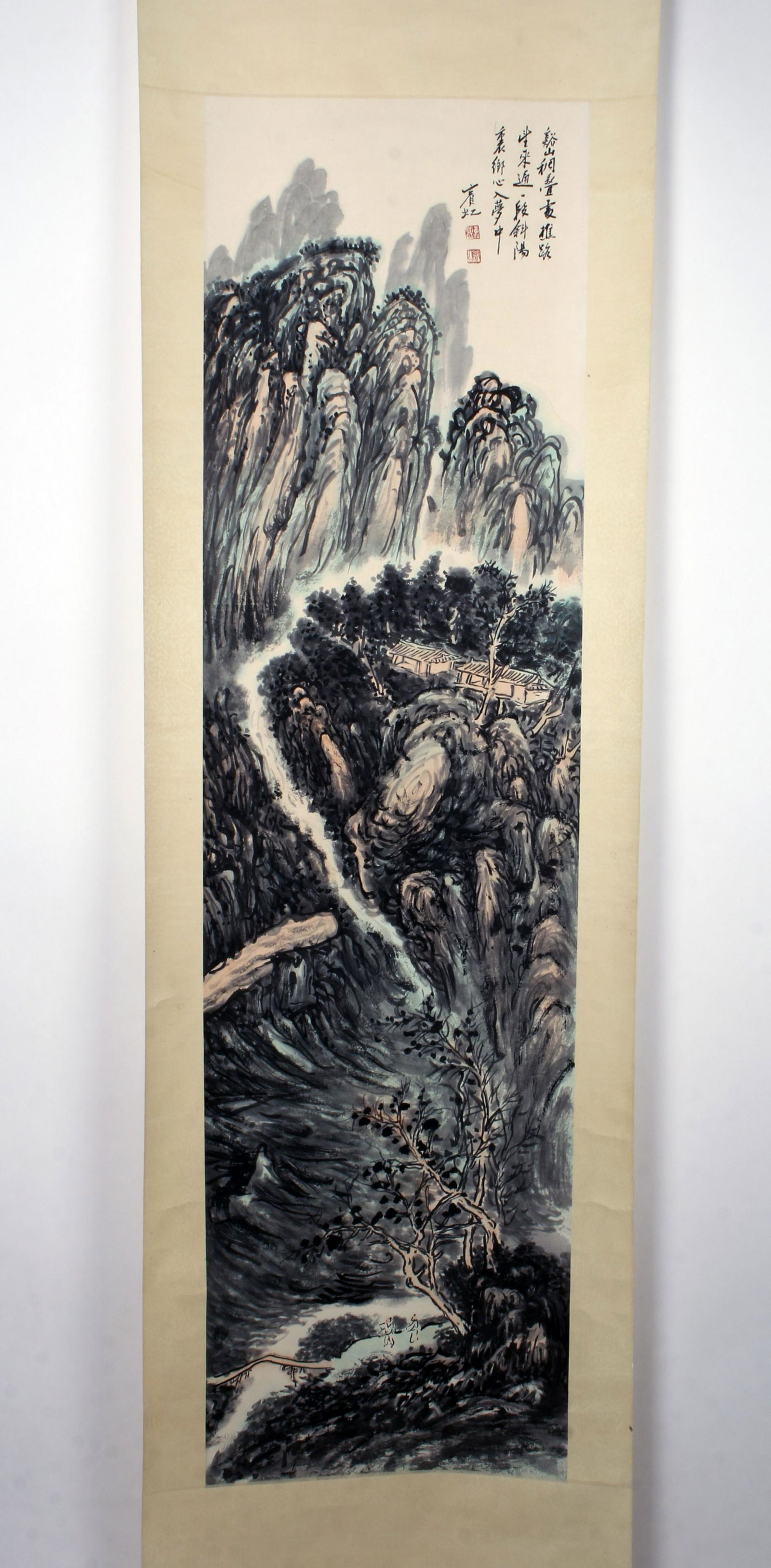 CHINESE SCROLL OF MOUNTAINOUS LANDSCAPE: CHINESE SCROLL OF MOUNTAINOUS LANDSCAPE Lush mountainous landscape with a river. A village is in the distance. Calligraphy a