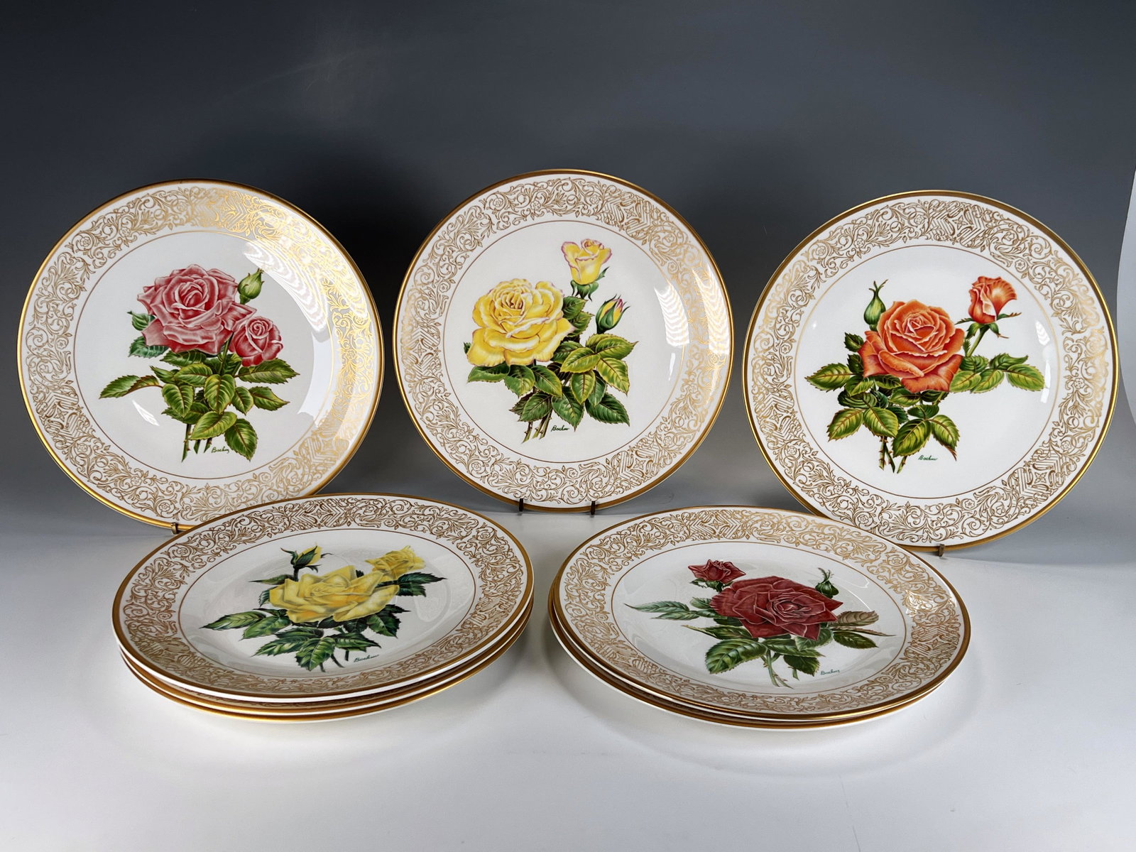 8 BOEHM ROSE PLATE COLLECTION LIMITED EDITION: 8 BOEHM ROSE PLATE COLLECTION LIMITED EDITION Eight 11" plates featuring varying varieties of colorful roses in full bloom. Marked on back The Edward Marshall Boehm Rose Plate Colle