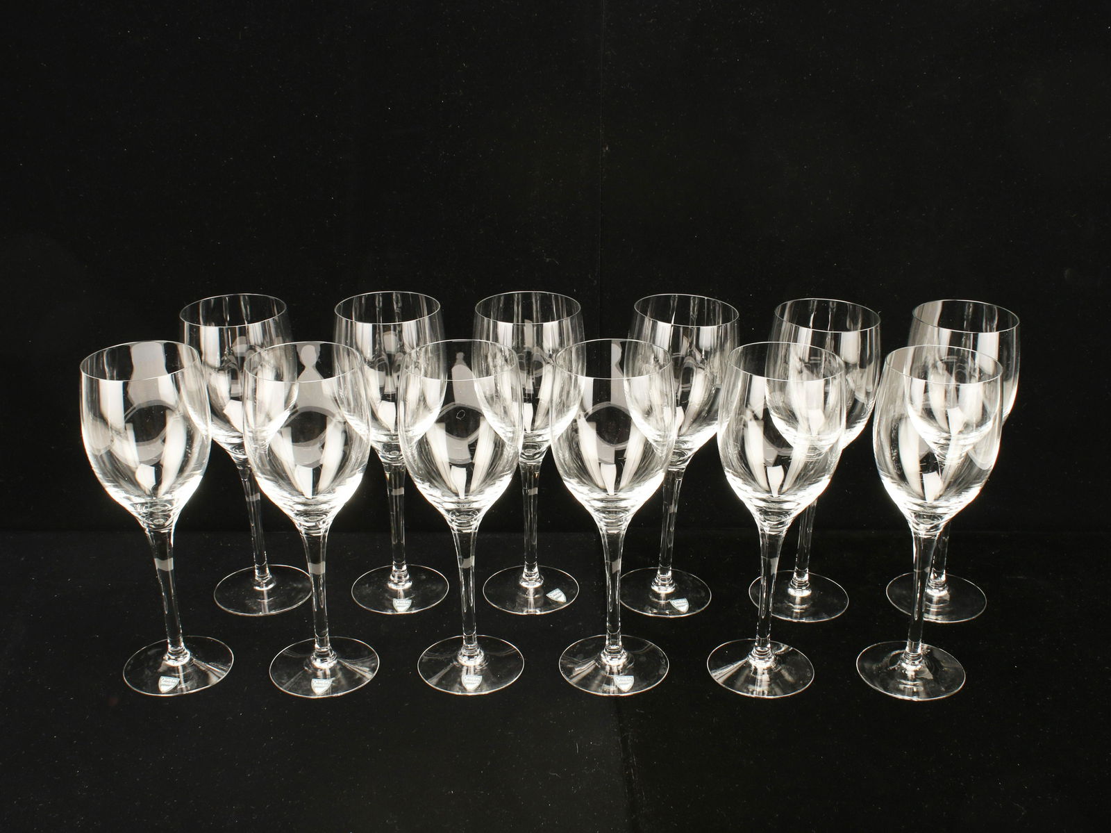 12 ORREFORS ILLUSION CLEAR WATER WINE GOBLET: 12 ORREFORS ILLUSION CLEAR WATER WINE GOBLET Twelve water or wine goblets, some with Orrefors label. 8 1/4" X 2 3/4" Shippin