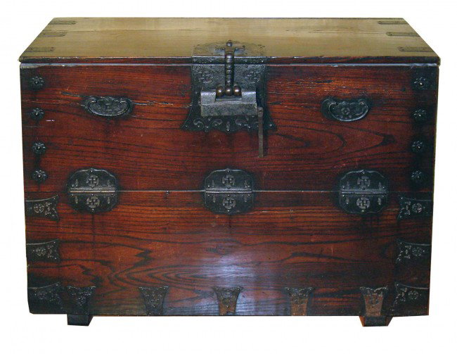 Korean Storage Trunk: A Korean yew wood and iron bound storage chest, featuring iron pulls and a lock on the door which opens outward in the front. 102cm X 83cm X 43cm.
