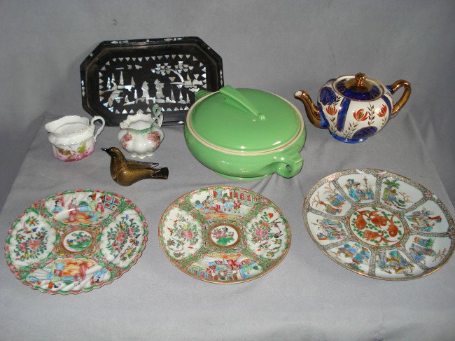 Assorted Ceramics: Including three Chinese Famille Rose plate (two with rim chipping), a tea pot, a cream & sugar, an Italian art glass bird , lacquer tea tray and casserole