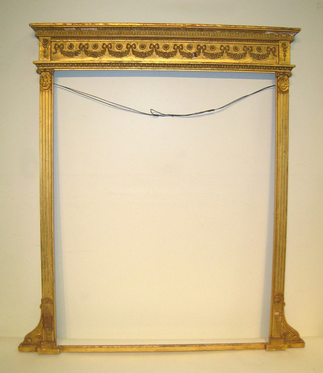 Gilt Wood Mantel Mirror Frame: A gilt wood Regency style carved pier or over mantel mirror frame, 58 1/2" X 52" wide.