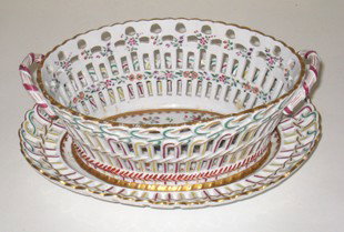 Reticulated Samson Ware Bowl And Platter: A reticulated amorial bowl with its 10 1/2" X 8" matching platter. Samson began his career by making service and set piece replacements in the late 1830s. In 1845 he opened the ceramics firm Samson, E