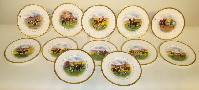Hunting Theme Plates By Minton: A remarkable set of 12 dinner plates by Minton for J. E. Caldwell each painted with a different fox hunting scene.
