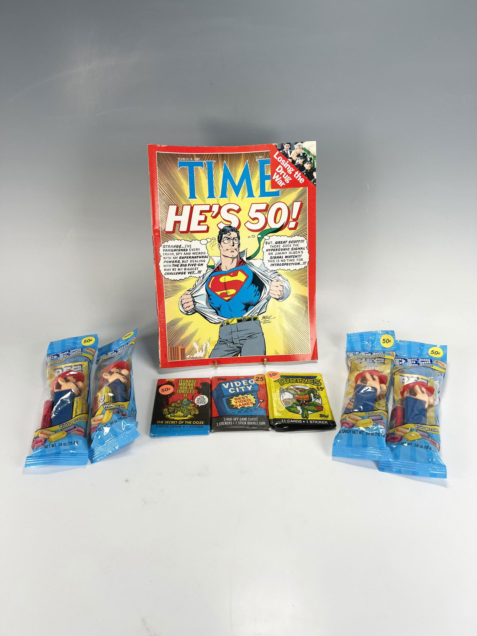 COLLECTIBLE LOT SUPERMAN MARIO BROS TMNT: COLLECTIBLE LOT SUPERMAN MARIO BROS TMNT Time Magazine celebrating Superman's 50th March 14, 1988. 4 Mario Pez dispensers in original wrappings. Topps Teenage Mutant Ninja Turtles trad