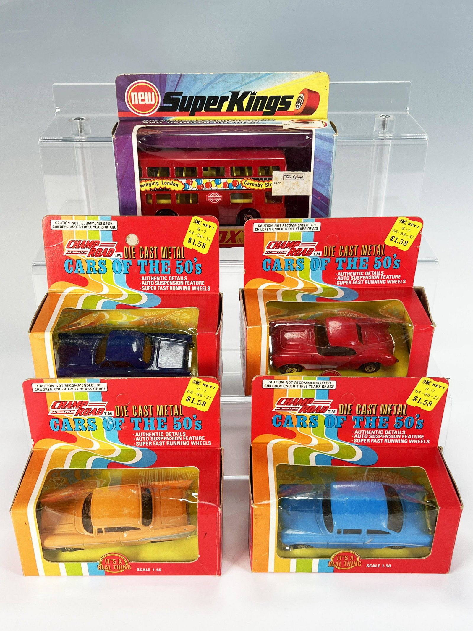 CARS OF THE 50S & MATCHBOX SUPER KINGS: CARS OF THE 50S & MATCHBOX SUPER KINGS Four Champ of the Road die cast cars. Models based on '56 Corvette, '57 T Bird, '56 Chevy and '57 Chevy. Also contains Matchbox the Londoner