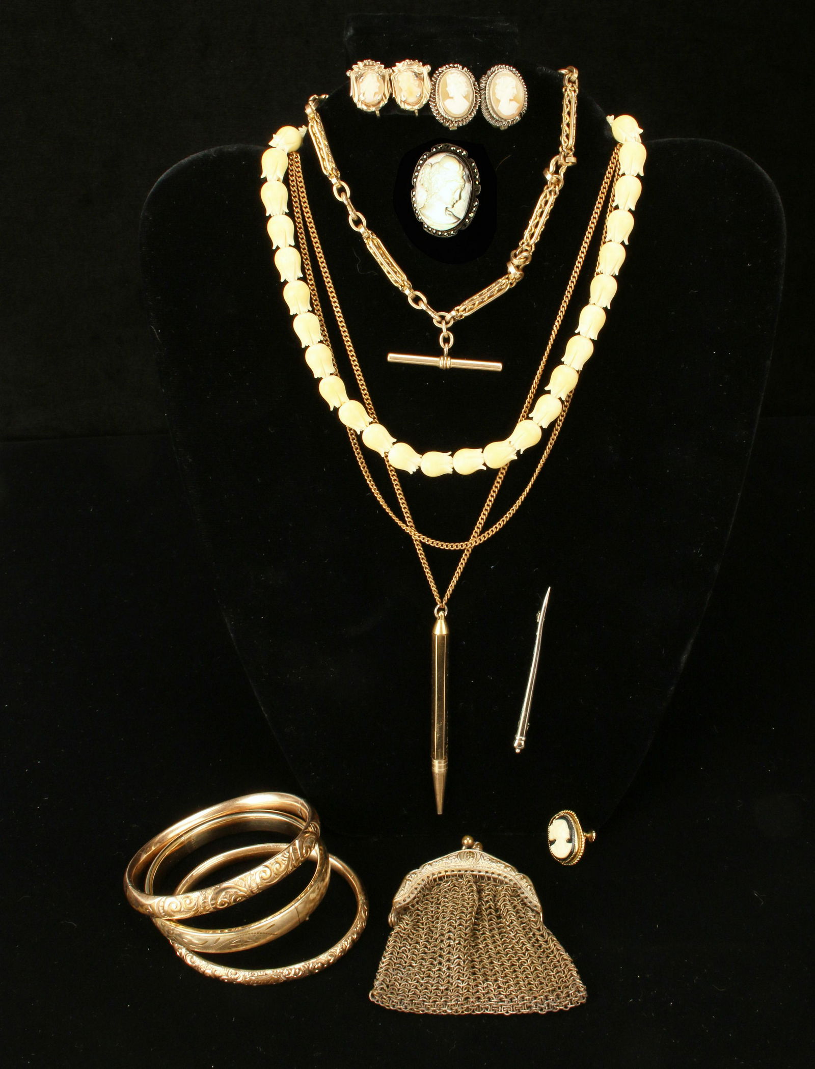 VINTAGE JEWELRY BANGLES, MESH PURSE, WATCH CHAIN, CAMEOS: VINTAGE JEWELRY BANGLES, MESH PURSE, WATCH CHAIN, CAMEOS Vintage jewelry lot. Three hinged bangles, the one engraved "Mary" marked 12KTGF. Lot includes sceptor pin, 2 pair came