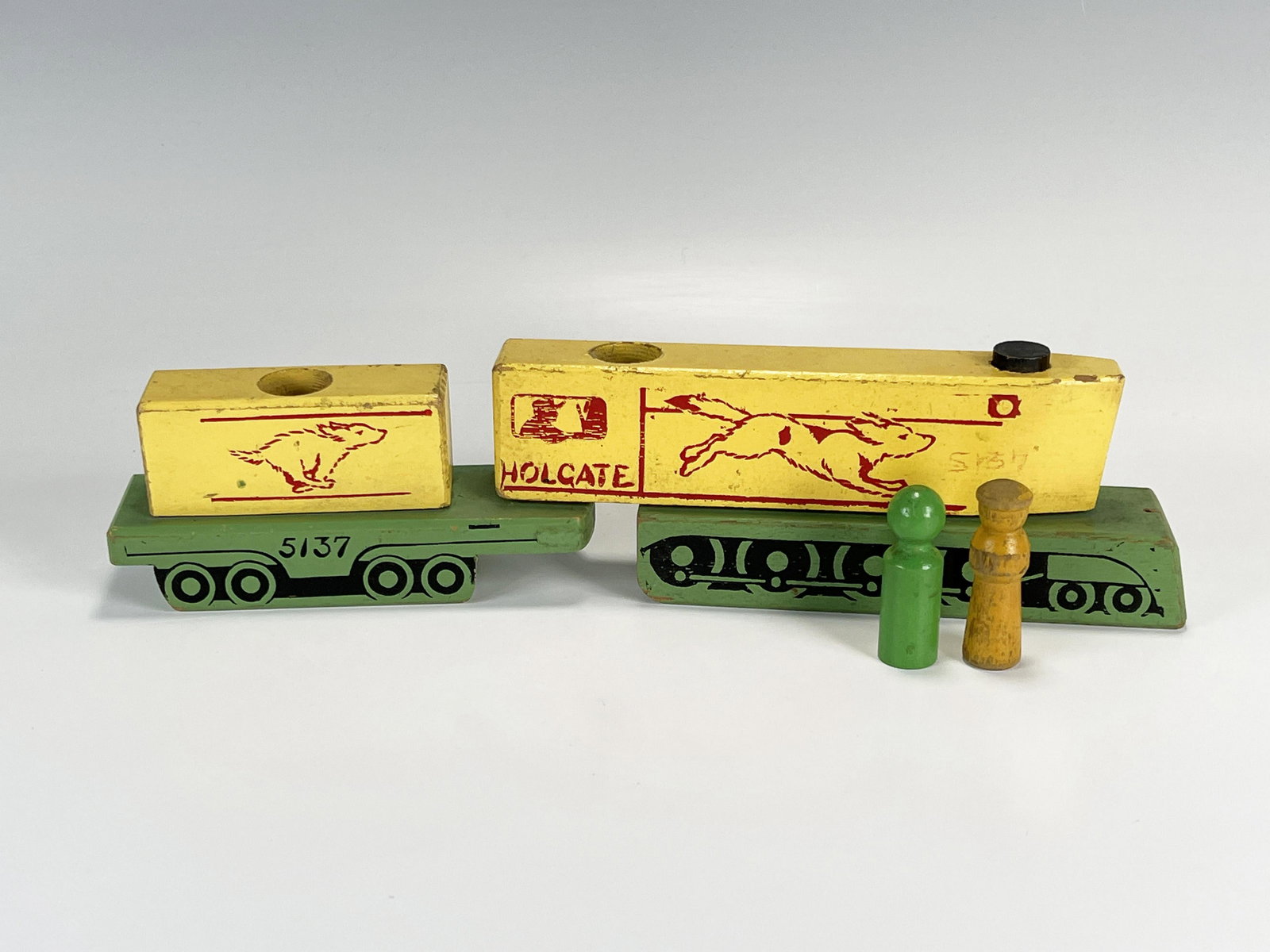 HOLGATE VINTAGE WOODEN TRAIN TOY: HOLGATE VINTAGE WOODEN TRAIN TOY Believed to be from the 1950's, Wear consistent with age. 12" x 3 3/4" x 2" Shipping:<