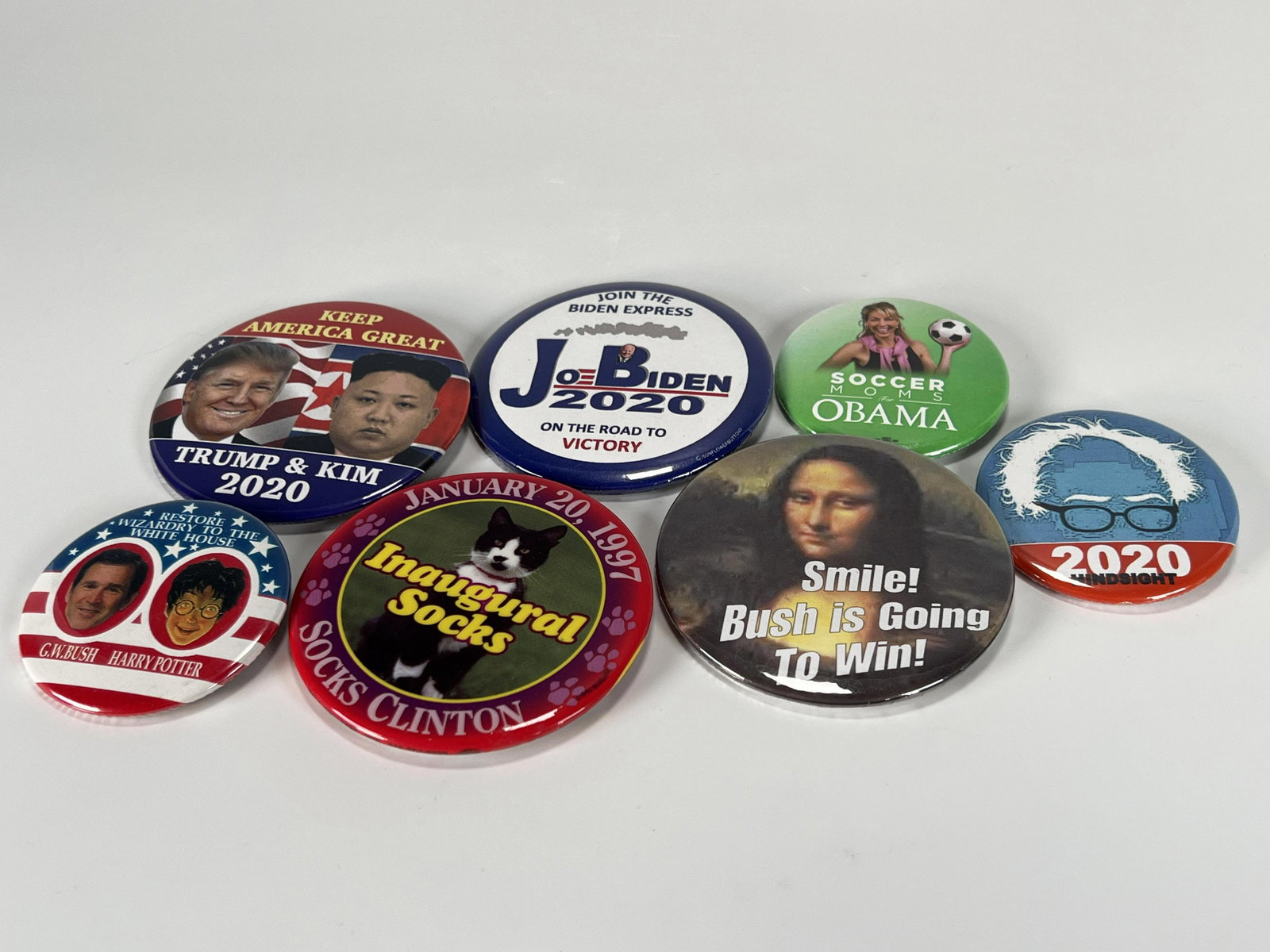 UNIQUE UNUSUAL SATIRICAL POLITICAL PINS: UNIQUE UNUSUAL SATIRICAL POLITICAL PINS Trump/Kim, Soccer Moms for Obama, Socks, and more. 3" Shipping: