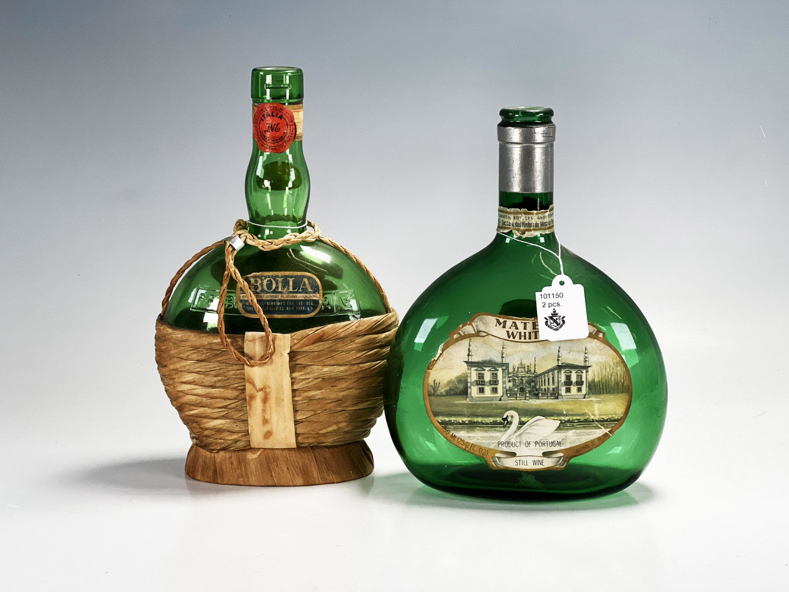 TWO VINTAGE MATEUS & BOLLA WINE BOTTLES: TWO VINTAGE MATEUS & BOLLA WINE BOTTLES Empty bottles of Mateus White and vintage Bolla red wine bottle. Just add a color-dripped candle! 9" x 5 1/