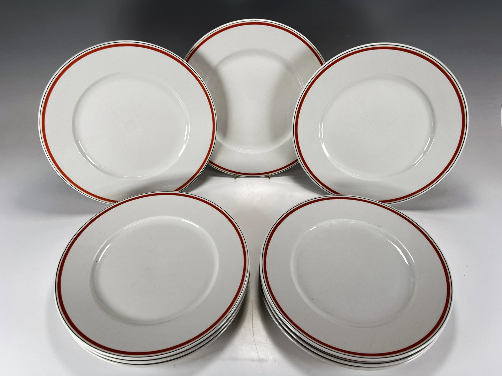 9 FRENCH SERVICE BISTROT LOBJOY PLATES: 9 FRENCH SERVICE BISTROT LOBJOY PLATES 9 - 11" Plates with orange and black stripe, marked Service Bistrot Creation Jacques Lobjoy Made in France on bottom.