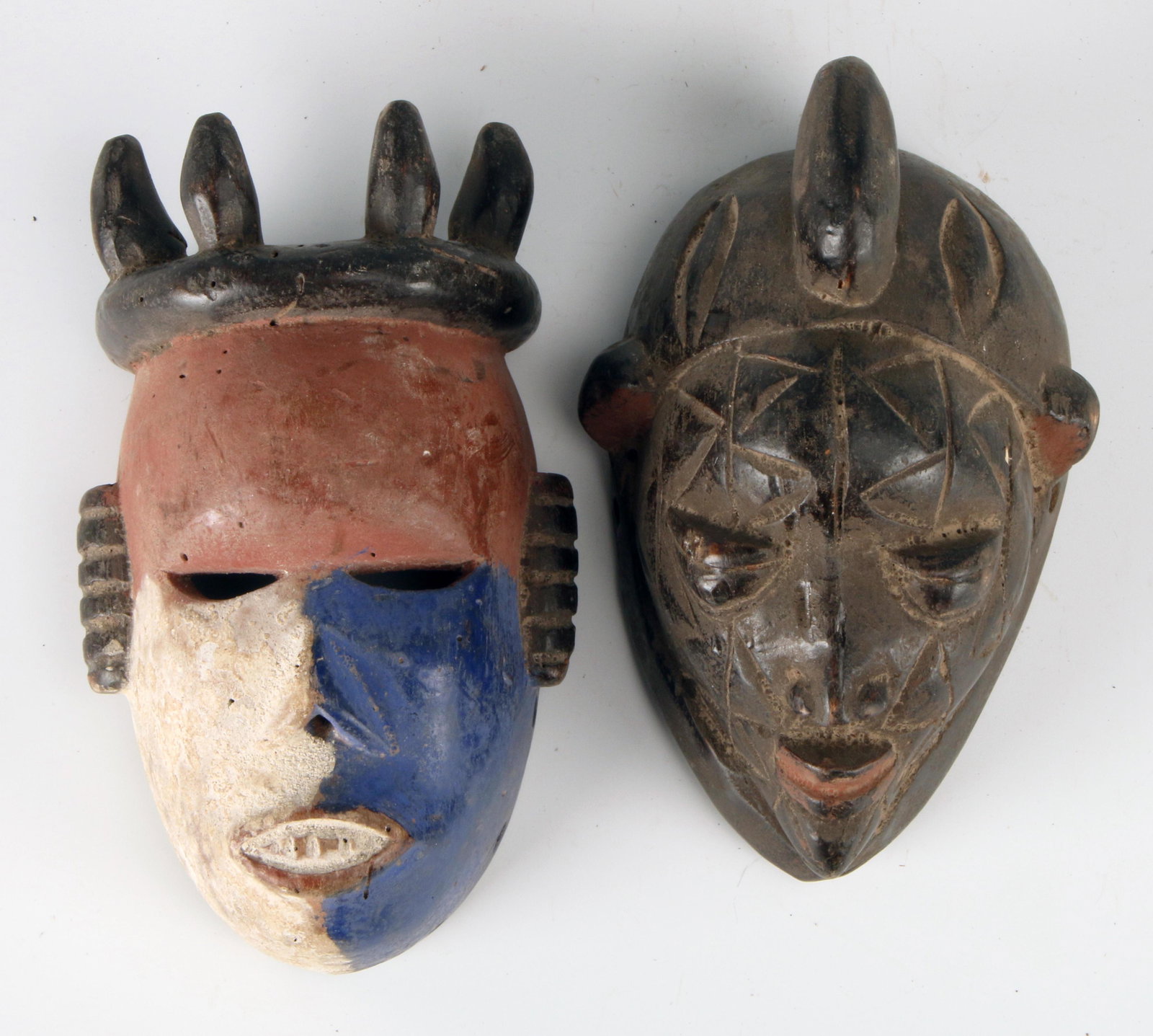 TWO AFRICAN MASK PASSPORTS (1 of 4)