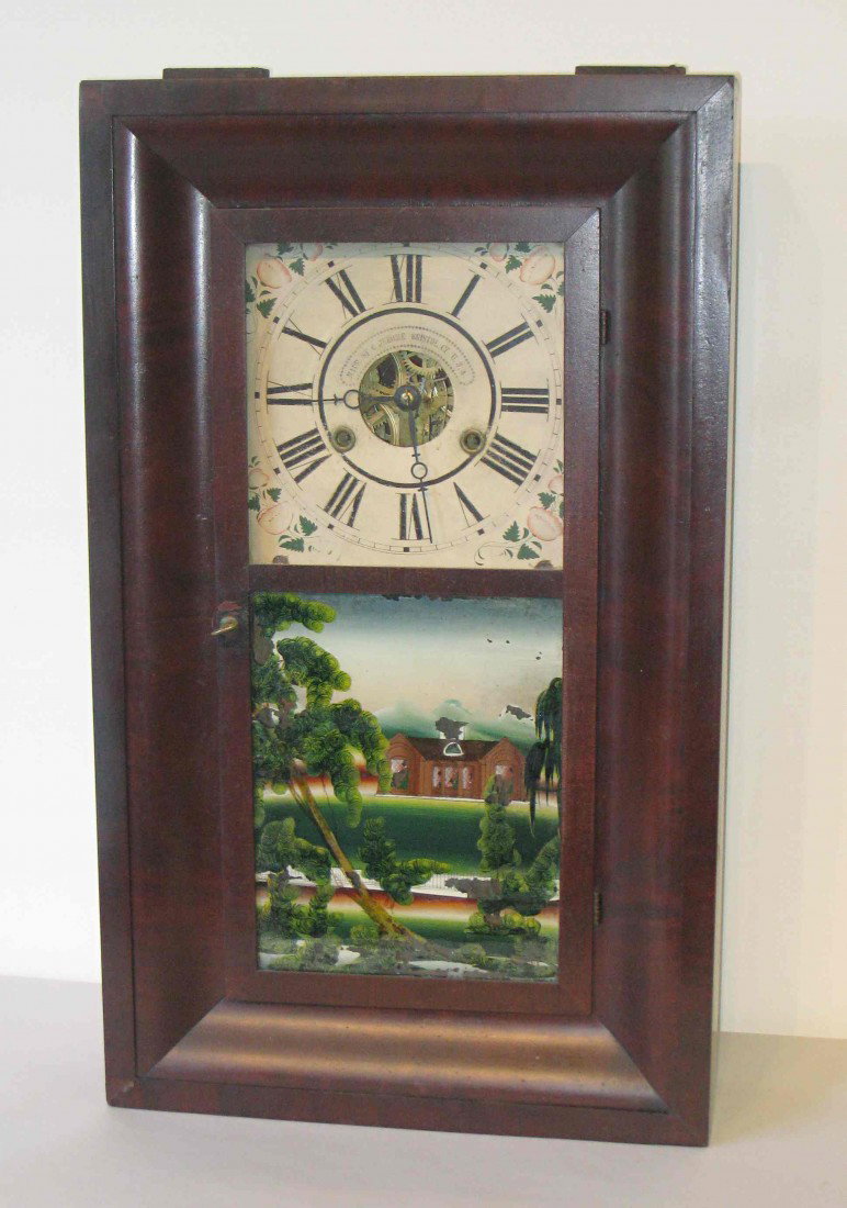 Ogee Clock by C. Jerome, Bristol, Ct, USA: A mid 19th century ogee clock in excellent condition, with the original untouched wood dial, thirty hour brass weight driven clockworks, old original finish and original rustic landscape reverse paint