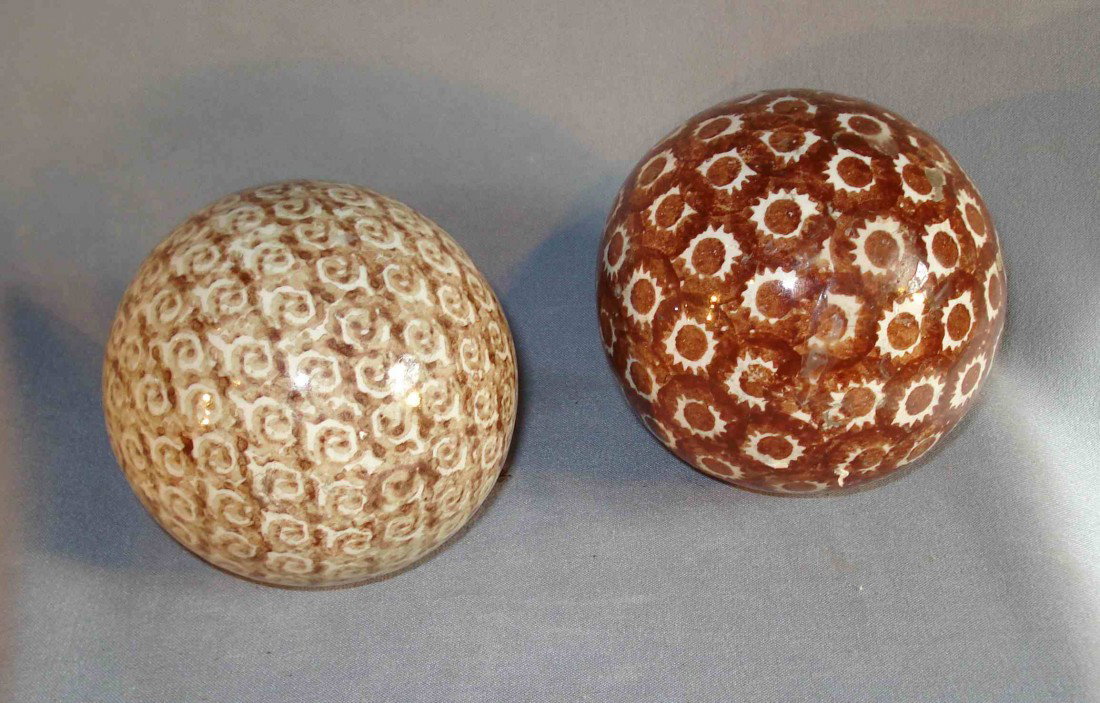 Two Carpet Balls: Two colored carpet balls, each about 3-4" in diameter.