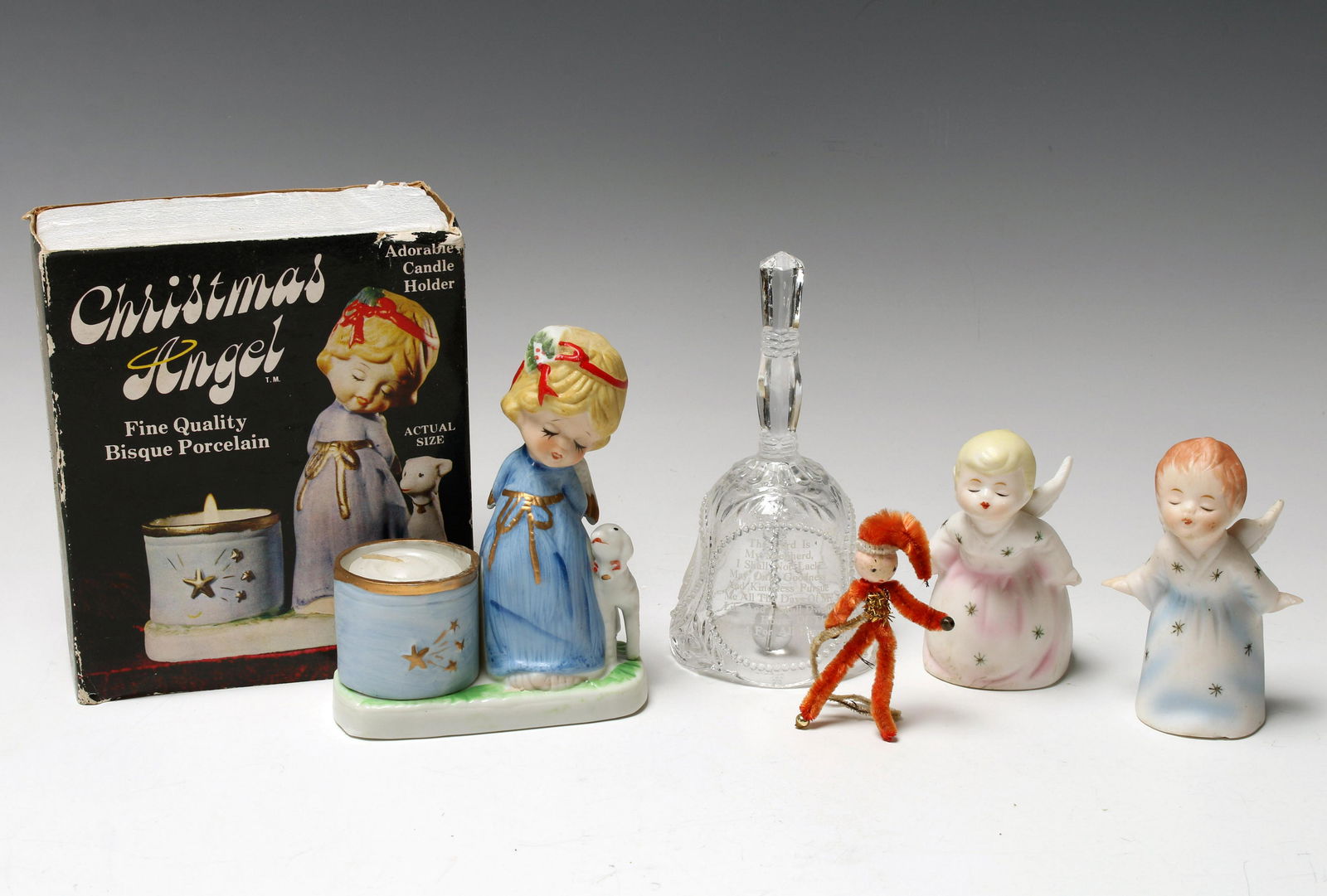 LOT OF CHRISTMAS ANGELS CANDLEHOLDER BELL: LOT OF CHRISTMAS ANGELS CANDLEHOLDER BELL Two angels leaning in for a kiss. Etched glass bell. Christmas Angel candle holder in box. Blue angel has broken wing.