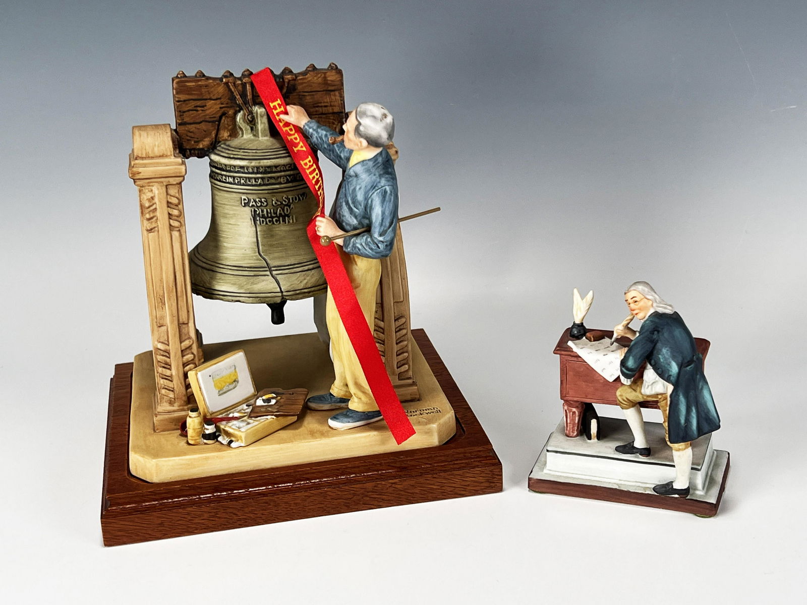 TWO NORMAN ROCKWELL INDEPENDENCE DAY FIGURES NUMBERED (1 of 8)