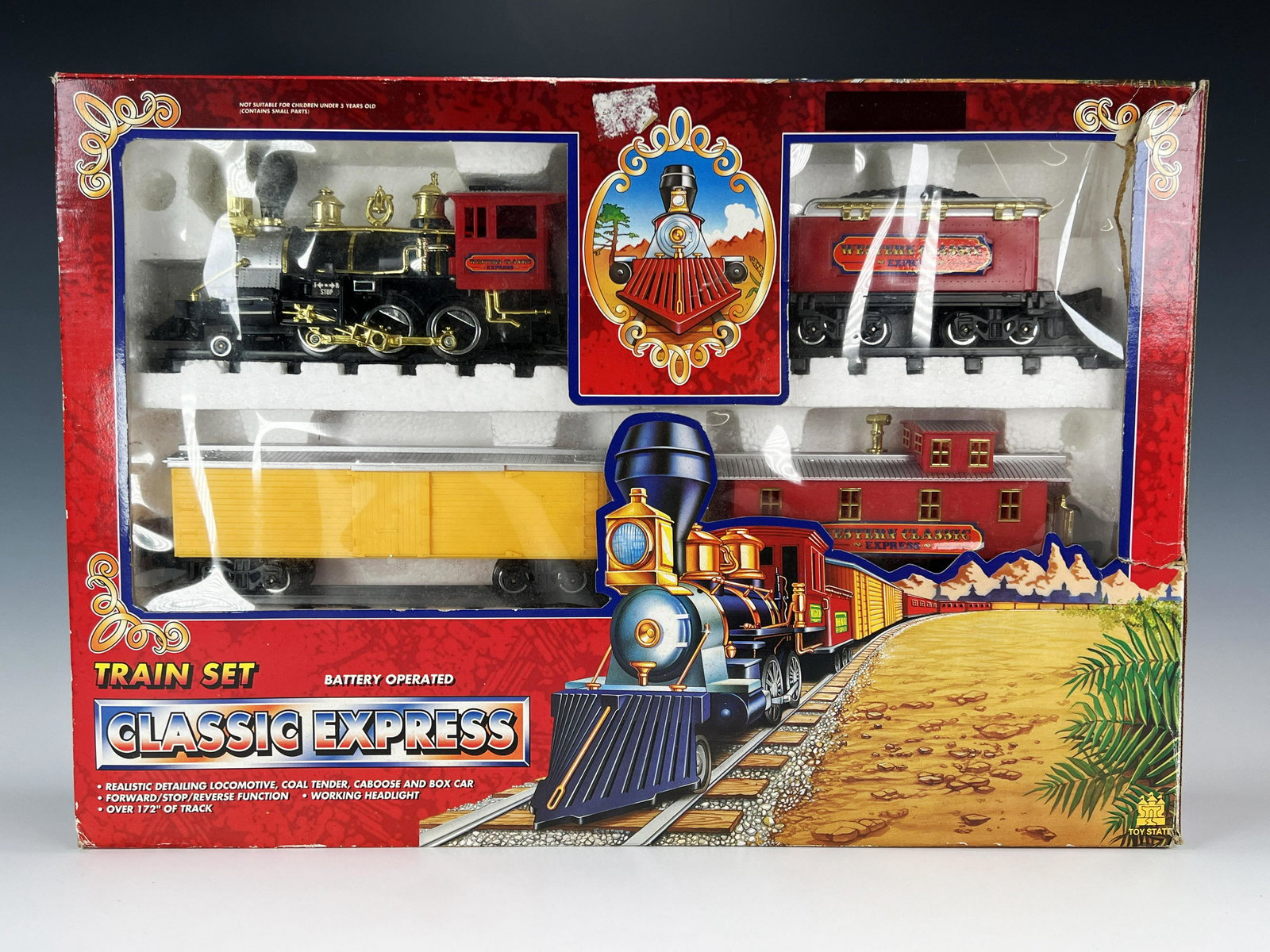 CLASSIC EXPRESS TRAIN SET IN BOX: CLASSIC EXPRESS TRAIN SET IN BOX Engine, two cars, caboose and tracks. Easy to assemble. Battery operated set has forward/reverse/on/off switch 25"