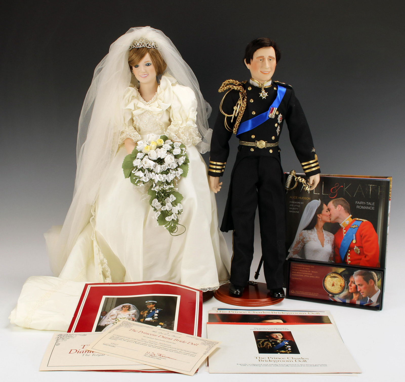 DANBURY MINT PRINCES DIANA & CHARLES DOLLS IN BOX COA: DANBURY MINT PRINCES DIANA & CHARLES DOLLS IN BOX COA A royal collection of memorabilia from multiple generations of the royal family. With original boxes and CoA. Train on Dianas dr