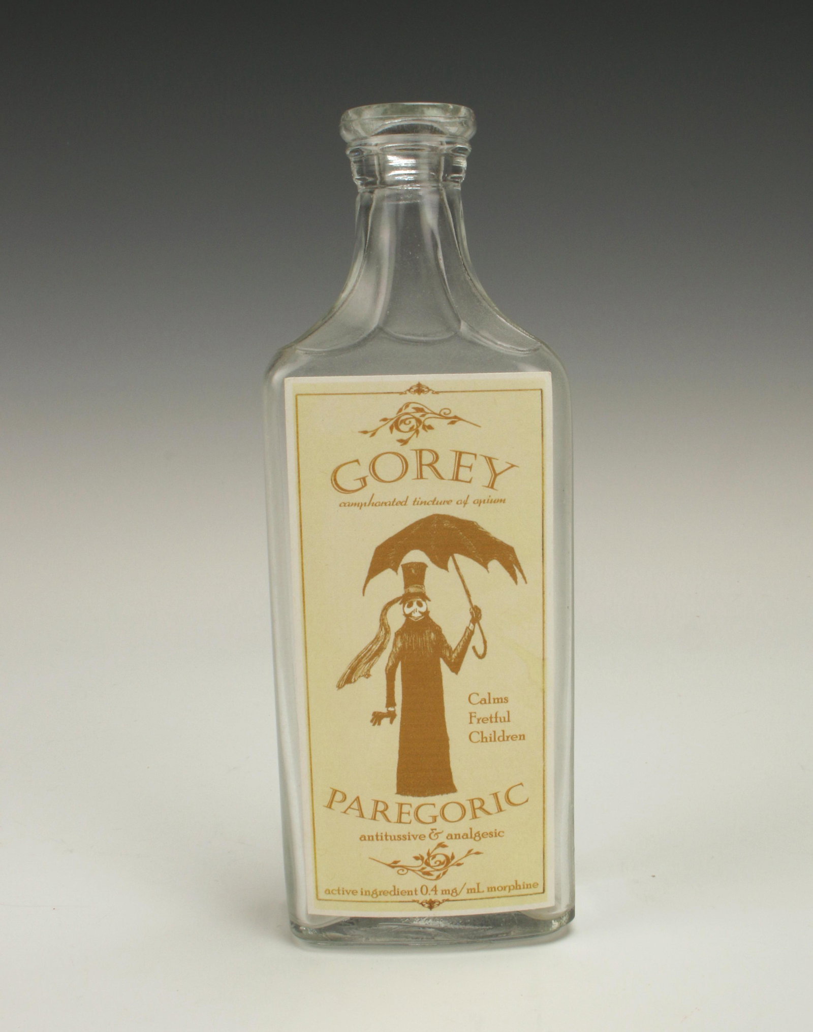RARE EDWARD GOREY EPHEMERA PAREGORIC LABELED BOTTLE: RARE EDWARD GOREY EPHEMERA PAREGORIC LABELED BOTTLE Paper label with sepia Gore