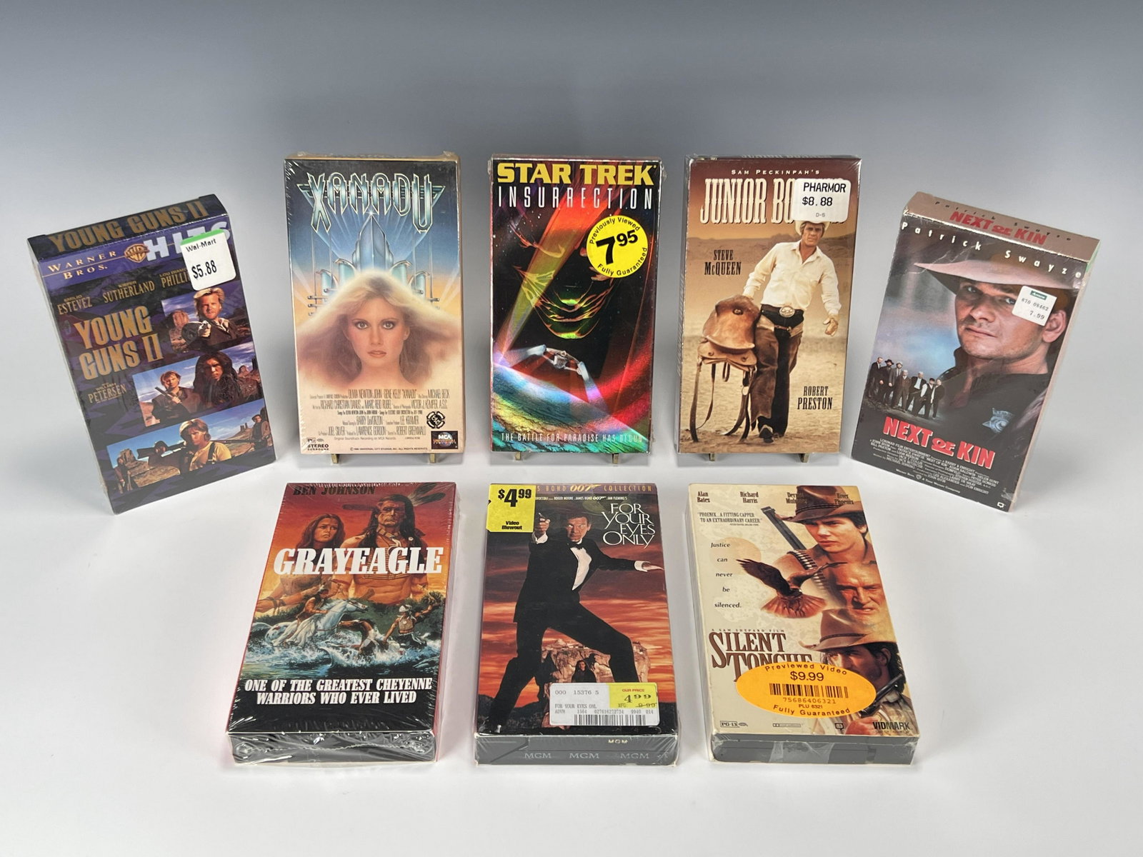 LOT OF SEALED VHS TAPES STAR TREK JAMES BOND: LOT OF SEALED VHS TAPES STAR TREK JAMES BOND Includes Xanadu, Young Guns 2, Star Trek Insurrection, For Your Eyes Only, and more! Shipping: