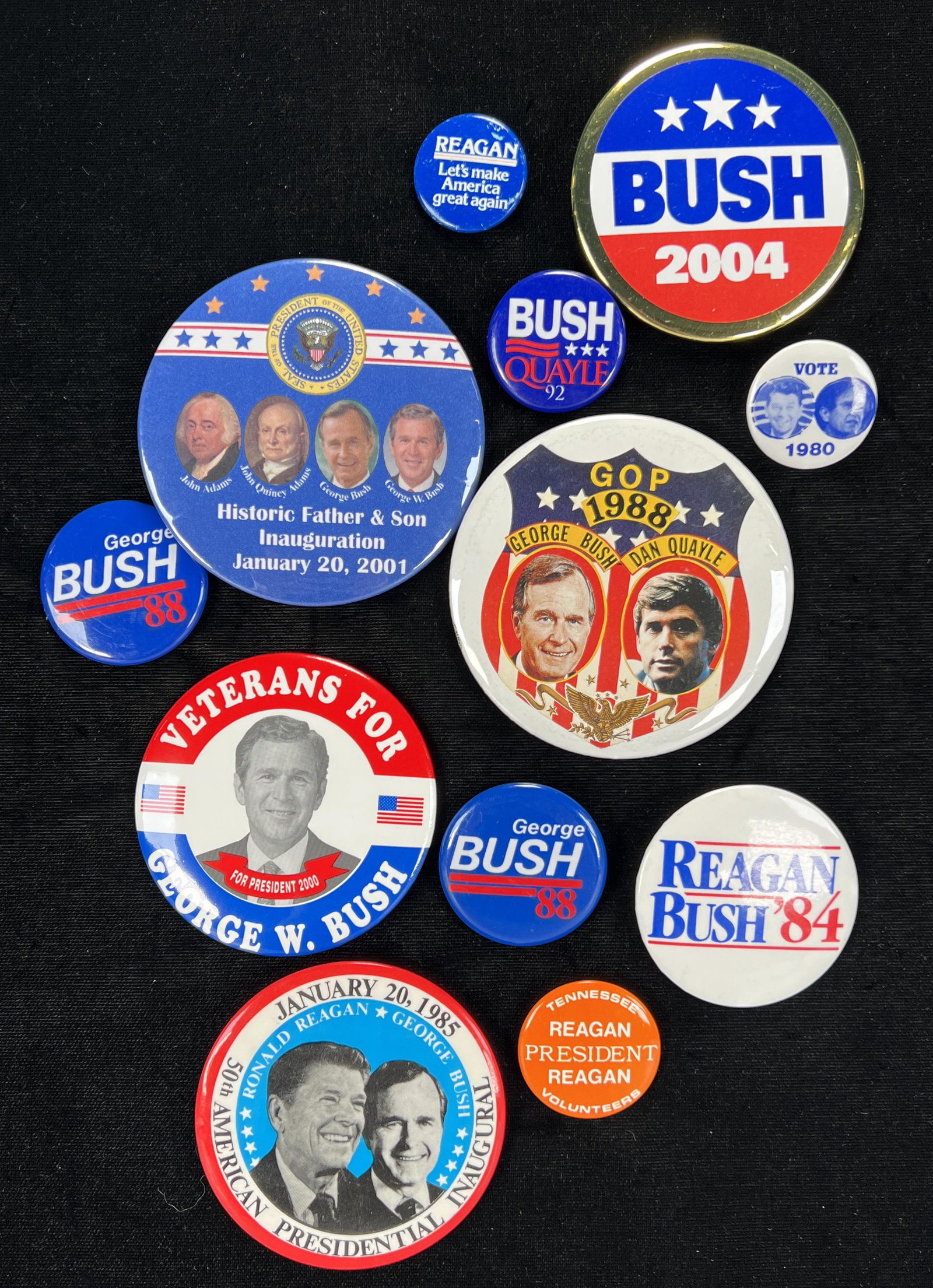 REAGAN/BUSH CAMPAIGN BUTTONS: REAGAN/BUSH CAMPAIGN BUTTONS Various pins supporting the campaigns of Reagan/Bush, Bush/Quayle, George W.Bush 3" Shipping: