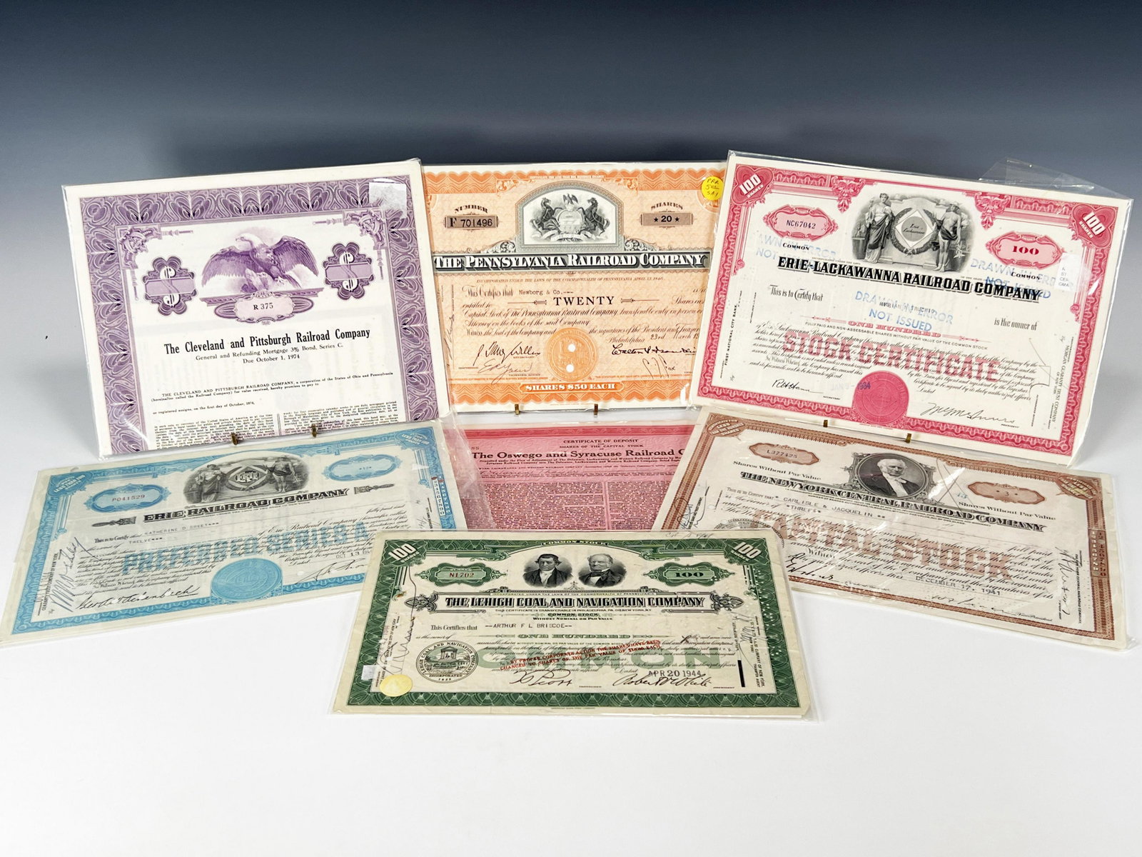 LOT OF RAILROAD STOCK CERTIFICATES PRR NEW YORK CENTRAL: LOT OF RAILROAD STOCK CERTIFICATES PRR NEW YORK CENTRAL Collection of antique of stock certificates for various early Mid-Atlantic and Mid-West railroads. No shortline unfortunately.