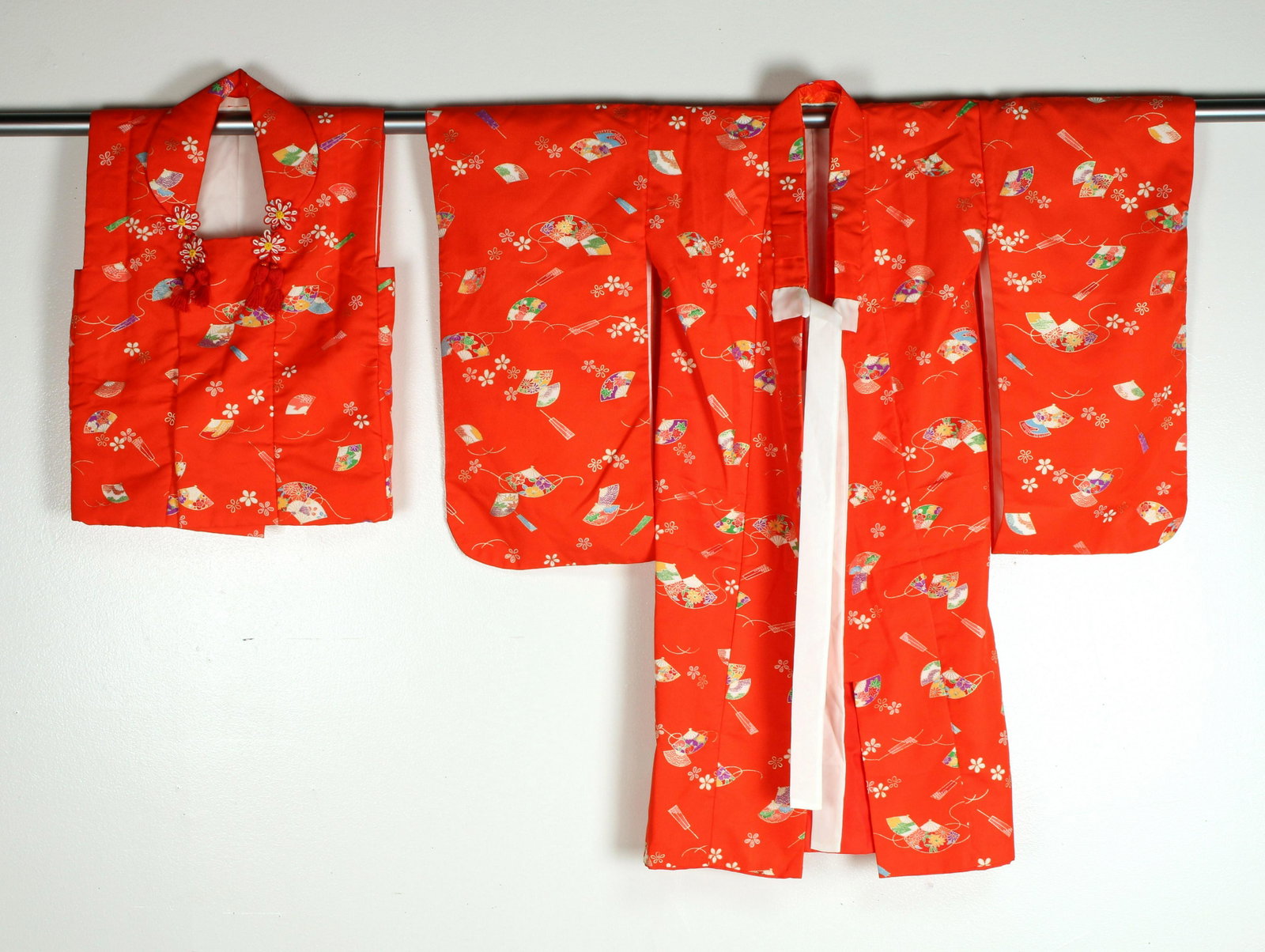 CHILDRENS SET OF KIMONO AND VEST: CHILDRENS SET OF KIMONO AND VEST In bright orange with multicolor fan pattern. 36 x 37" Shipping: Shipp