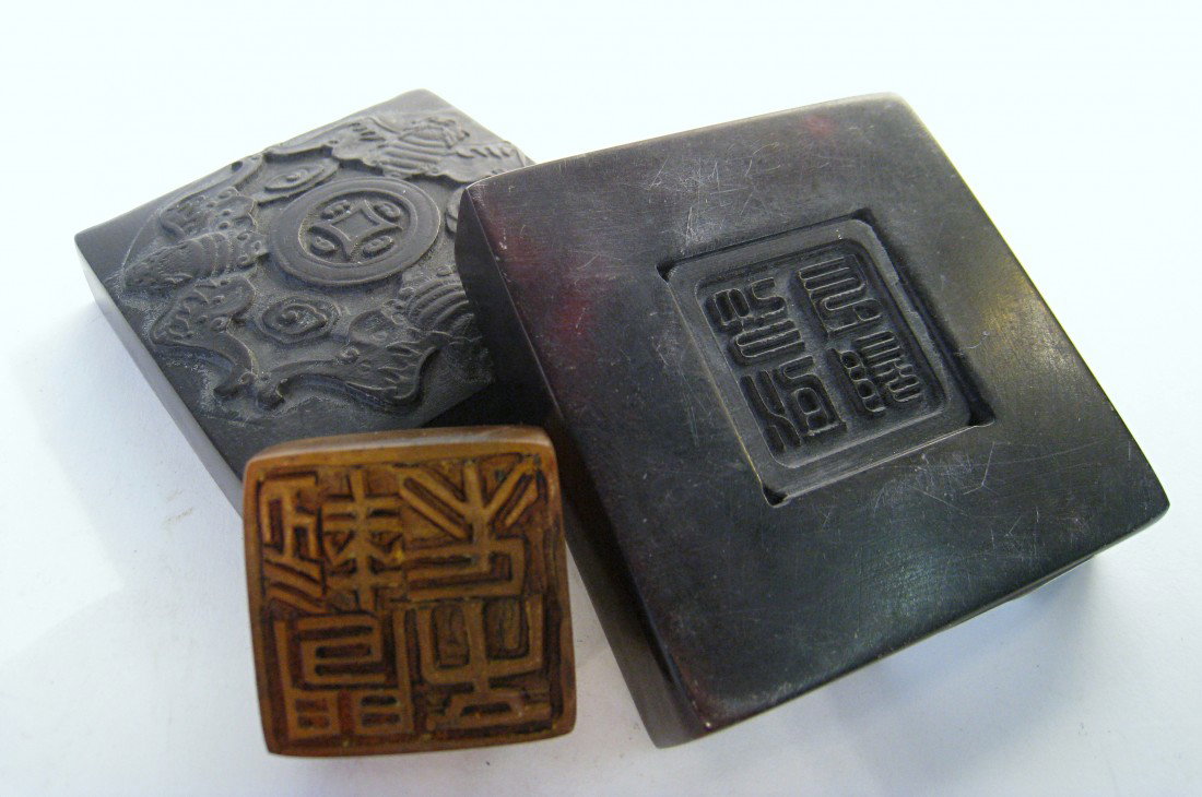 Hardstone Lidded Container And Seal: The container with three bats carved on top and inside a brown jade seal 2 5/8" square and less than an inch high.
